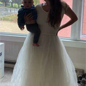 Wedding dress. Made in Canada. Tag says size 12. Fits 8 - 12. Vintage 90s